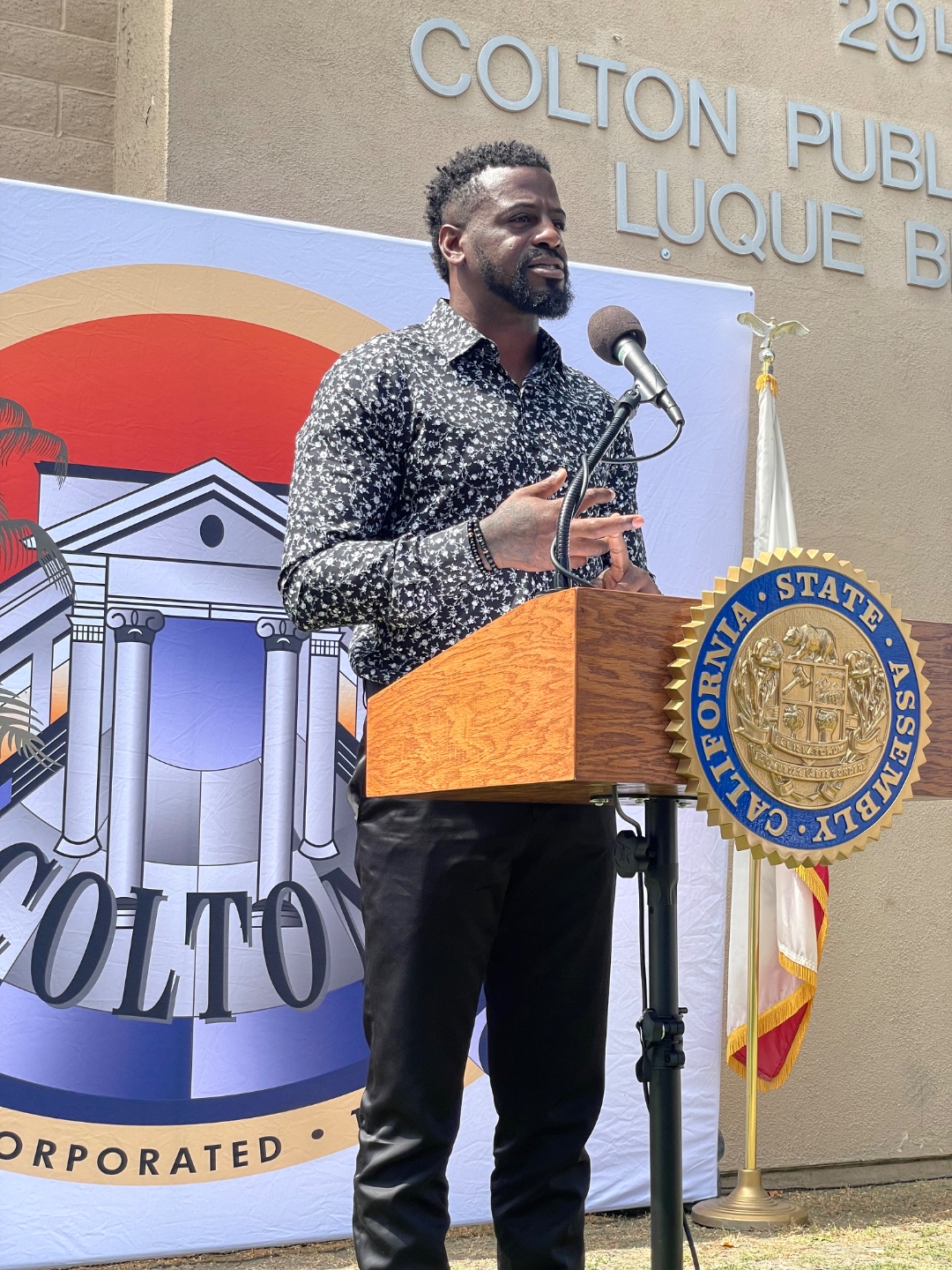 Shareece Wright at Colton Public podium — civic advocacy