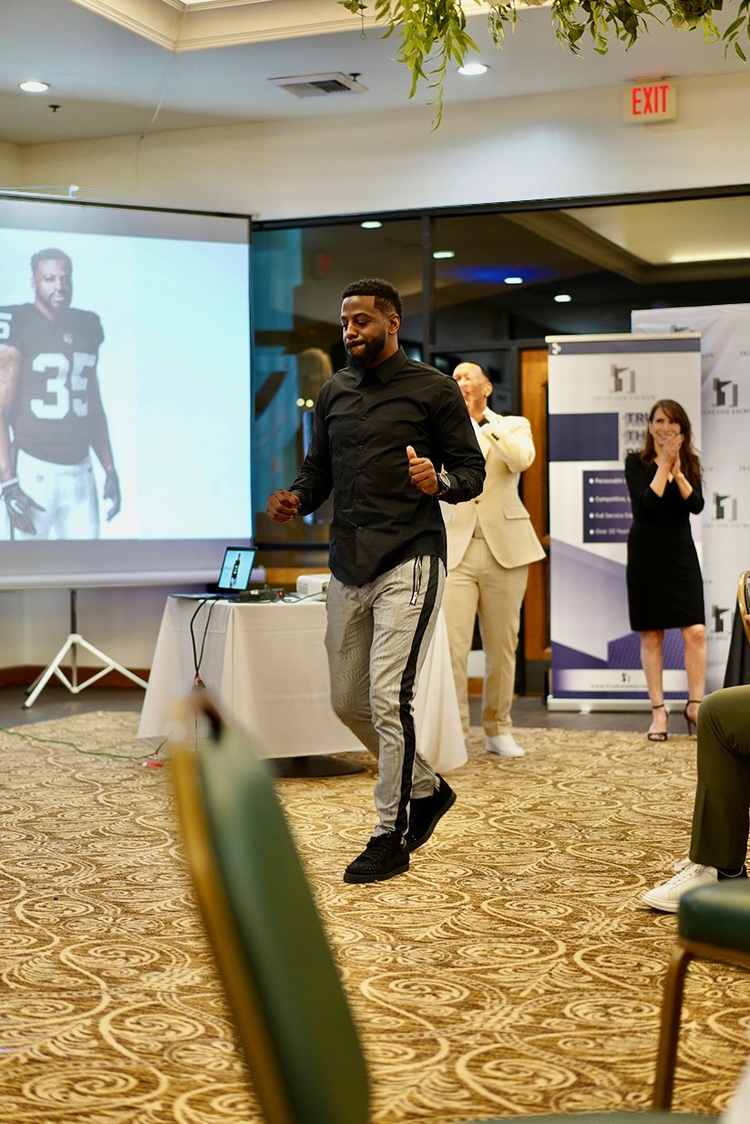 Shareece Wright receiving standing ovation at corporate event